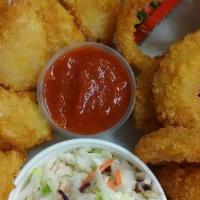Butterfly Shrimp Dinner W/ 2 Hushpuppies · Lightly breaded and fried butterflied shrimp served with 2 of our house made hushpuppies and...