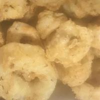Calamari Dinner W/ 2 Huhspuppies · Calamari rings, breaded and lightly fried served with hush puppies and your choice of 2 regu...