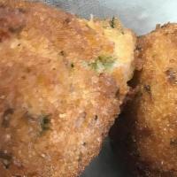 Hush Puppies · Our hushpuppies are made from scratch using our long held recipe. These are made in house as...