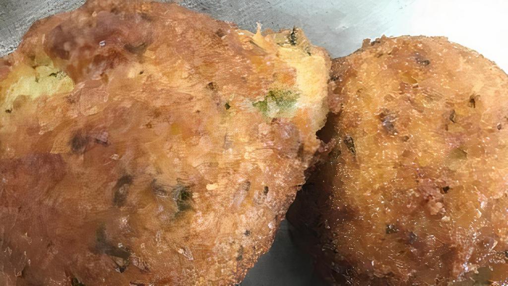 Hush Puppies · Our hushpuppies are made from scratch using our long held recipe. These are made in house as ordered. an order has 4 pups. These are a KEEPER!