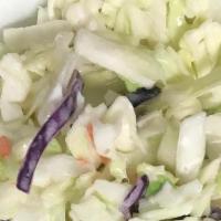 Cole Slaw · Our house made cole slaw from fresh green and purple canbage,, shredded carrots and our swee...