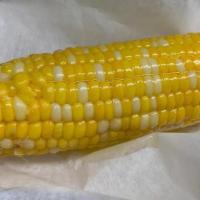 Corn On Cob · Fresh corn on the cob, served buttered, of course. Always a  favorite.