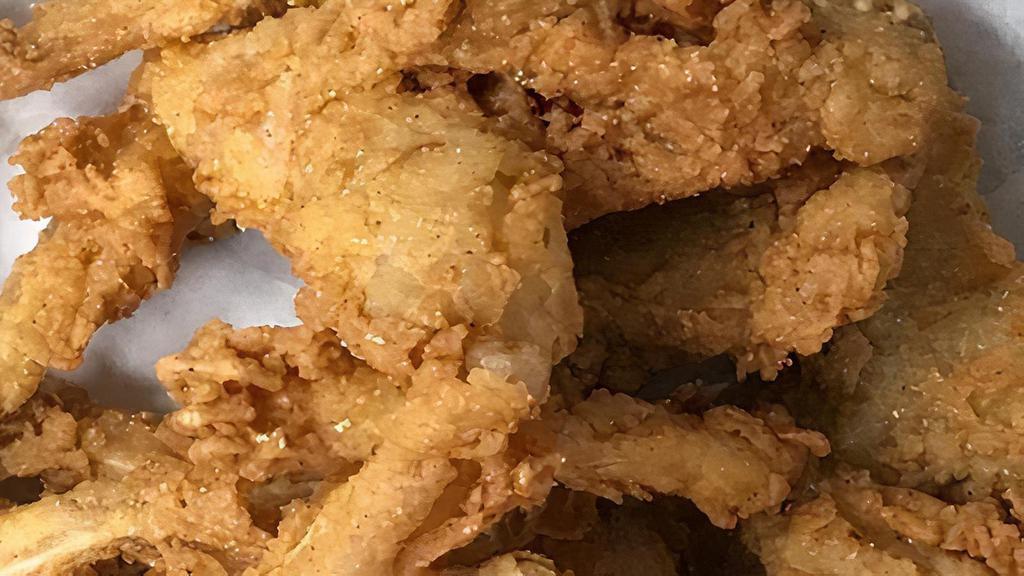 Single Pair Of Frog Legs · Single pair of our fresh frog legs, lightly breaded in our breading, served with your choice of dipping sauce.
