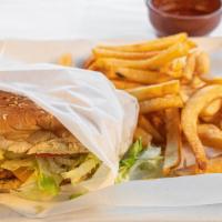 Chicken Sandwich · Grilled chicken breast, tomatoes, lettuce, avocado, and light mayo with a side of fries.