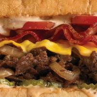 Cheeseburgerwich · Tender sirloin steak, smoked bacon, American cheese, tomatoes, caramelized onions, and pickl...