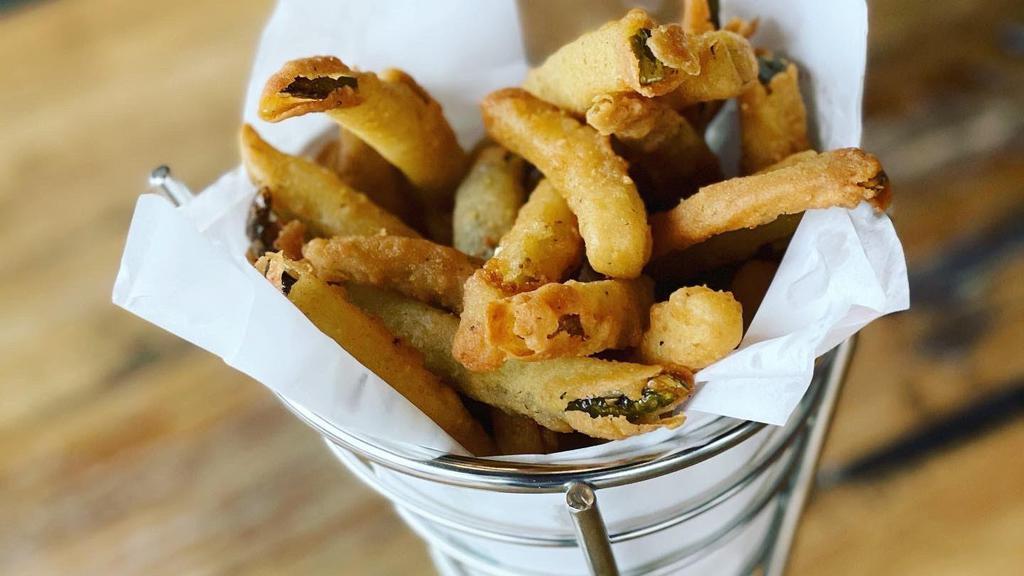 Fried Pickle Fries · If you love fried pickles you will LOVE these!  Dill pickles sliced into the size of shoestring fries, breaded and deep fried to a crispy perfection!