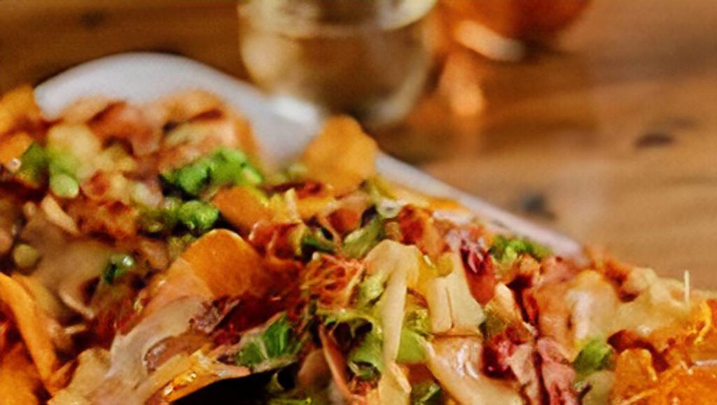 Loaded Pimentos Chips & Cheese · Potato chips, topped with our pimento cheese sauce, a three-cheese blend of cheddar, pepper Jack, and Parmesan, honey glazed pepper bacon, and scallions.