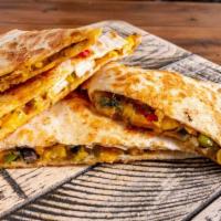 Beef & Chorizo Quesadilla · The perfect blend of beef & chorizo inside a crispy tortilla shell, filled with a 3 cheese b...