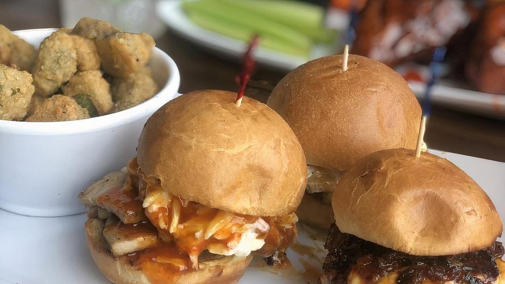Sliders · Served on brioche bun and choice of a side.