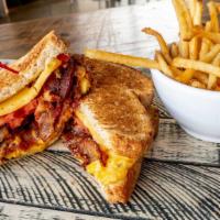 Grown Up Grilled Cheese · Jalapeño pimento cheese, swiss and cheddar cheese, grilled tomatoes, and honey glazed pepper...