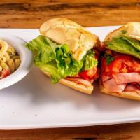 Holiday Hot Ham And Cheese · Our favorite holiday ham, cheddar cheese, lettuce, tomato, mayonnaise, and spicy honey musta...