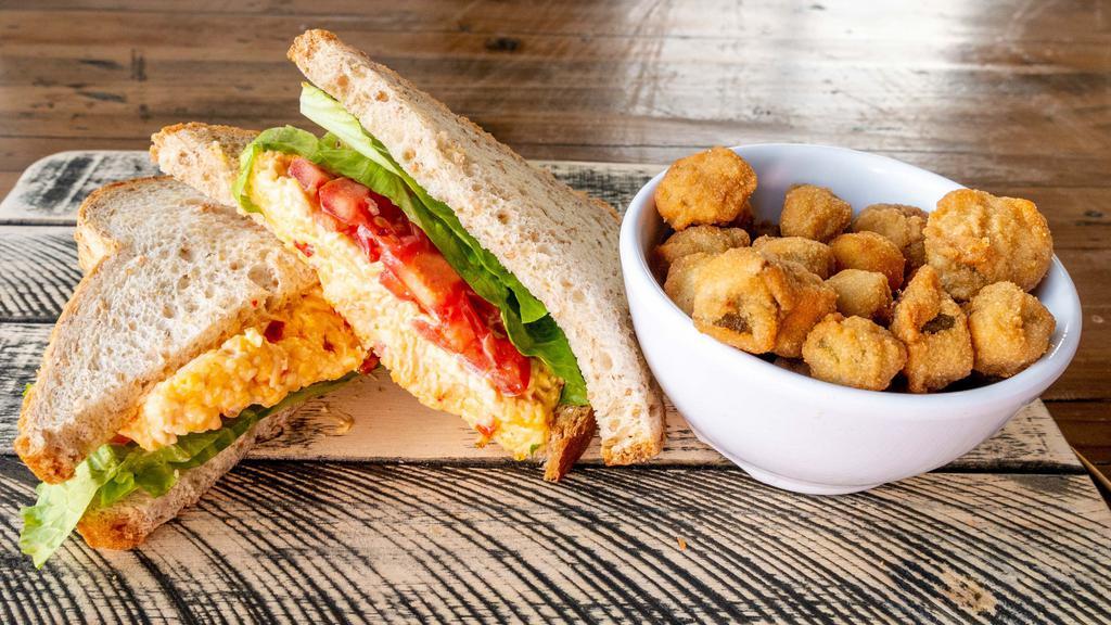 Pimento Cheese Sandwich · Served on your choice of white, wheat, or rye bread. Comes with a pickle spear and your choice of a side.