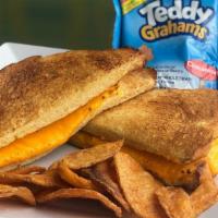 Grilled Cheese · Classic grilled cheese with American cheese.