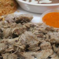 Lunch Carnitas · Slow-cooked, juicy roasted pork chunks. Served with rice, beans, and flour tortillas.