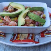 Ceviche De Camarón · Shrimp cooked with lime juice, freshly prepared with onions, tomatoes, cilantro, and avocado.