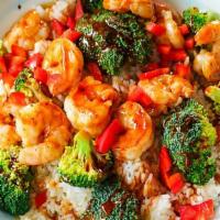 Shrimp Bowl · Plumb grilled shrimp, served on a bed of rice with broccoli, red peppers, and our homemade b...
