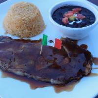 Bourbon Glazed Ribeye · Very juice and flavorful hand-cut steak top with our homemade bourbon sauce. Served with two...