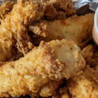 Chicken Tender Basket · Four golden fried chicken tenders. Served with fries