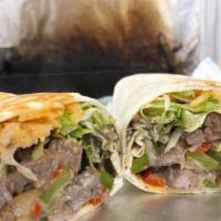 Burritos · Come get our humongous burrito! Your choice of meat on a 14 inch flour tortillas with beans,...