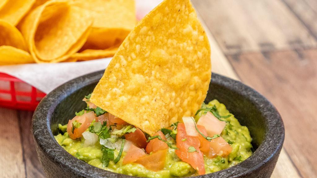 Guacamole · Fresh avocados, diced onions, diced tomatoes, chopped cilantro and lime juice all mixed for a tasty dip.