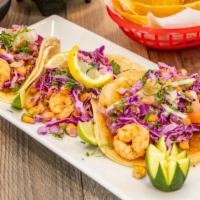 Californian Tacos · Three soft corn tortilla tacos with shrimp (imported) or fish, topped with cabbage, pico de ...