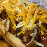 Chili Cheese Dog · Nathan's all-beef hotdog topped with homemade chili and cheese. Served in a New England roll.