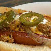 Charlie Hustle · Angus all beef hot dog split with bacon cooked in topped with Coaches chili, beer cheese, gr...