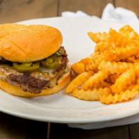 Mexican Burger · Our half pound burger with cheddar cheese, jalapeno, lettuce and tomato. Served with your ch...