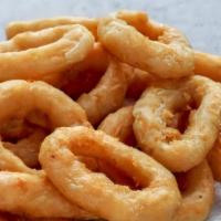 Onion Rings · Battered onion rings.