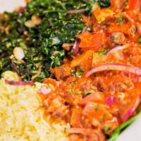 Curry Goat · Goat meat sauteed in onions, tomatoes, garlic, royco mchuzi mix and 