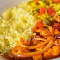 Chicken Curry · Tender pieces of boneless chicken breast and potatoes, sauteed in onions, tomatoes, curry, a...