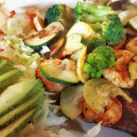 Tres Amigos · Tender grilled steak fillet and a tender grilled chicken breast topped with grilled shrimp, ...