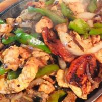 Fajitas · Your choice of tender slices of chicken, beef or a combination of both. Cooked with onions, ...