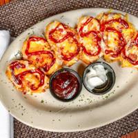 Bbq Chicken Potato Skins · Bbq chicken smothered with melted cheese, topped with bacon, and served with sides of sour c...