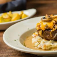 Chopped Steak · A blend of our signature sirloin steak, beef brisket, and ground chuck topped with sautéed o...