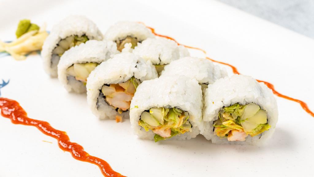 Orlando Roll · Shrimp tempura, cream cheese, lettuce, avocado topped w/ infamous crab salad and spicy mayo mix.