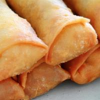Egg Roll · Green cabbage, carrot, noodles, seasoning rolled in a egg roll wrapper and fried. Served wit...