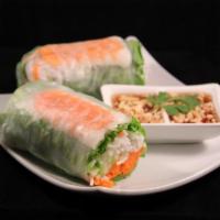Spring Roll · Green leaf lettuce, rice noodles, cucumber, carrots, and fresh mint leaves rolled in a rice ...
