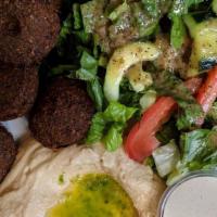 Falafel Plate · Fried ground chickpeas patties with spices, onions and parsley.