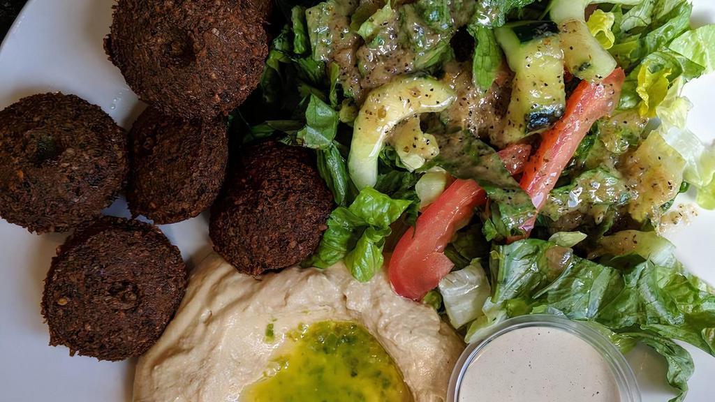 Falafel Plate · Fried ground chickpeas patties with spices, onions and parsley.