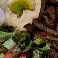 Gyro Plate · Mona's most popular. Spiced lamb and beef with tahini sauce. All dinners are served with sal...