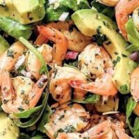 Shrimp Fajita Salad · Grilled shrimp with bell pepper  onion and tomato on a bed of iceberg lettuce shredded chees...