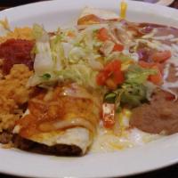 #14 One Beef Burrito Tipico · with rice & refried beans.