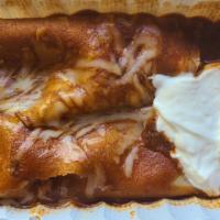 Enchiladas Suizas (Chicken) · Two corn tortillas slightly pan-fried, filled with chicken, and topped with La Hacienda crea...