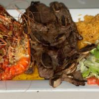 Pepe'Special · Grilled beef ribs and prawns in garlic served with rice and salad.