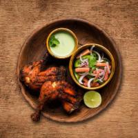 Charred Tandoori Chicken (Half) · Chicken marinated overnight in a prepared mix of yogurt, spices, herbs, and cooked in a clay...