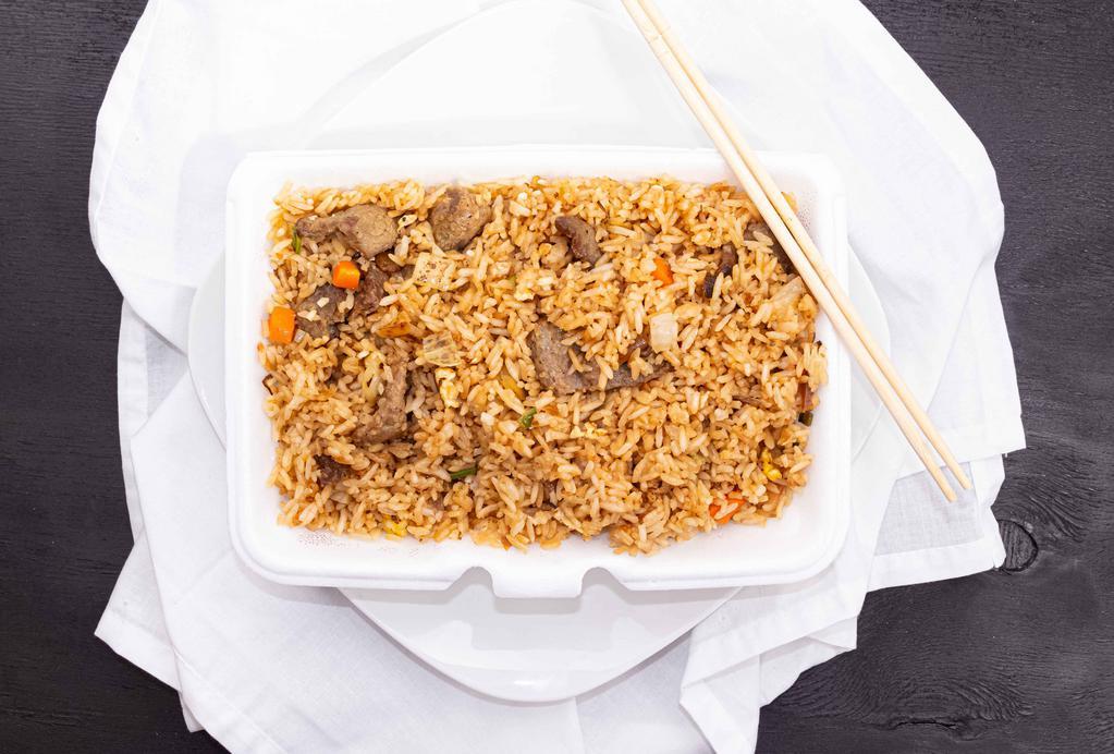 R1 Fried Rice · Wok-fried rice blended with egg, onions, carrots, green peas, soy sauce, and cooked with white rice. Served with Shanghai spring roll.