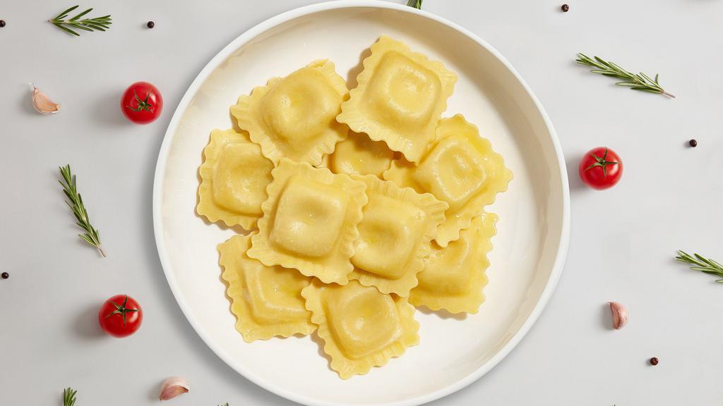 Custom Ravioli · Fresh cheese ravioli with your choice of protein, toppings and homemade sauce.