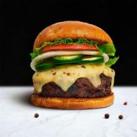 Jalapeno Burger · House-made, third pound seasoned patty perfectly cooked to medium, topped with topped with m...