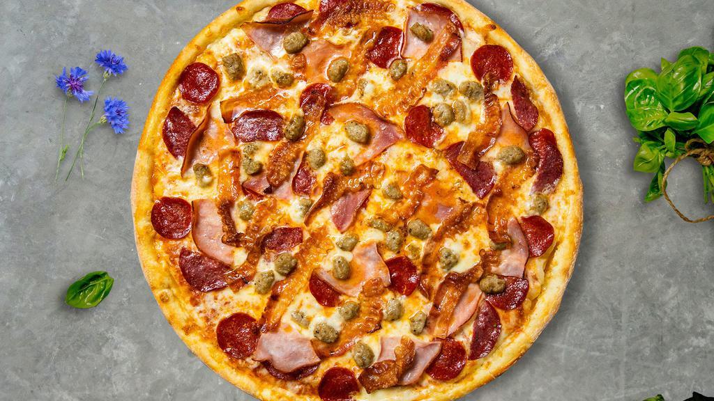 Meat Lovers Pizza · Our famous house made dough topped with red sauce, pepperoni, salami, canadian bacon, and our house cheese blend